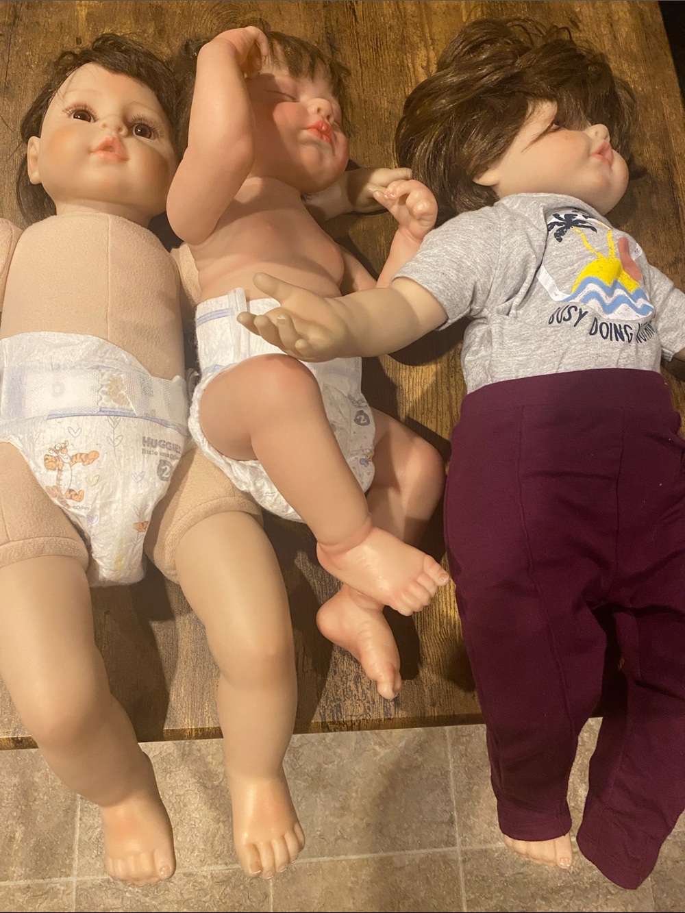 Set of Three Realistic Baby Dolls - Brown Hair